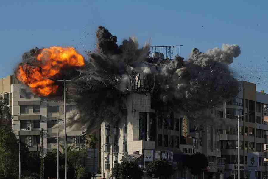 An explosion takes place in a building following an Israeli strike, amid escalating hostilities between Israel and Hezbollah, as the U.S.-Israel conflict with Iran continues, in Beirut, Lebanon, March 31, 2026.
