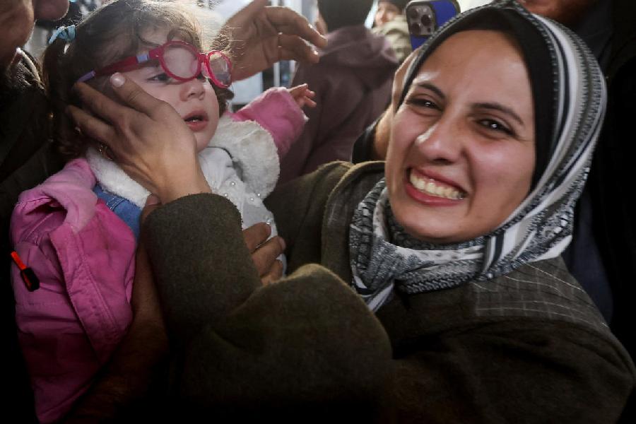 Palestinian mother Sundus al-Kurd embraces her daughter Bissan, who was evacuated as a premature baby from Gaza during the two-year Israeli offensive and has returned after medical treatment in Egypt, at Nasser Hospital in Khan Younis, southern Gaza Strip, March 30, 2026. 