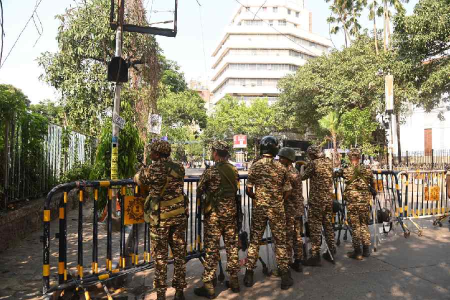 Security personnel outside the office of Bengal’s chief electoral officer on Strand Road on Wednesday afternoon. P