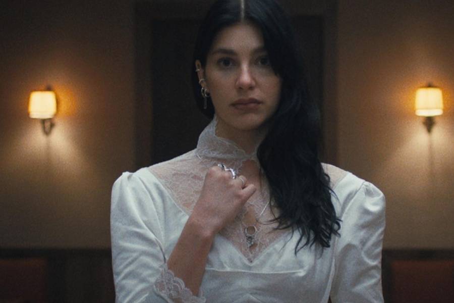 Camila Morrone as Rachel Harkin in Something Very Bad Is Going To Happen