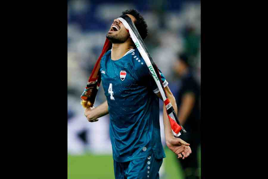 Iraq's Zaid Tahseen celebrates a goal