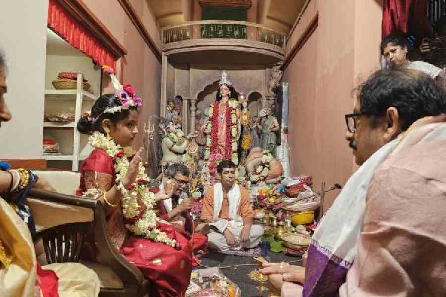 Mrinmoyee Gayen being worshipped as a virgin goddess in course of Annapurna puja in the AK Block residence of Aritra Sen