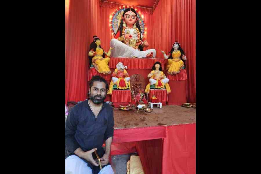 Joyraj Dey in front of the Annapurna idol created by him in DF Block, New Town. Pictures by Sudeshna Banerjee