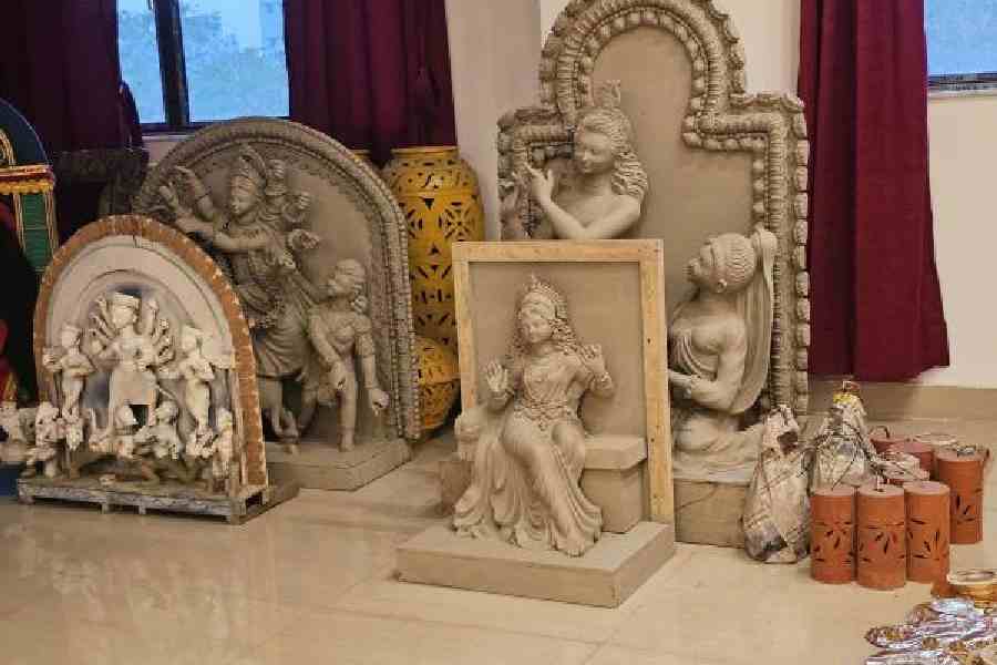 Clay figurines that form part of the decor at the restaurant Annodatri in New Town