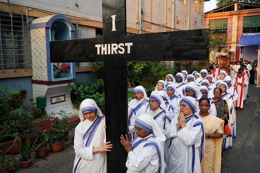 At the Missionaries of Charity, devotees marked Good Friday with solemn prayers and a procession led by nuns carrying the cross.