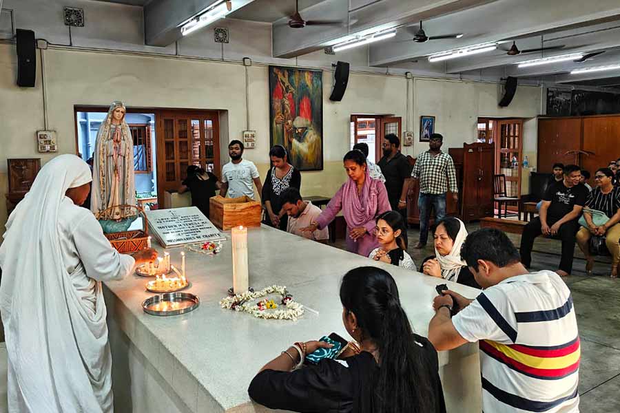 Candles flickered, and heads bowed in reverence, as the faithful gathered in reflection and remembrance