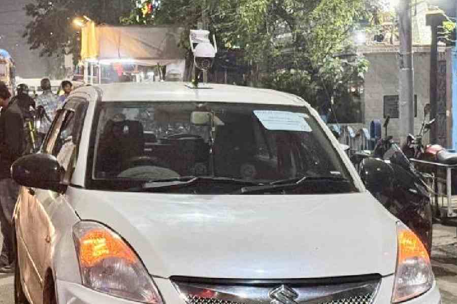 A car fitted with a roof-mounted camera on election duty in the city