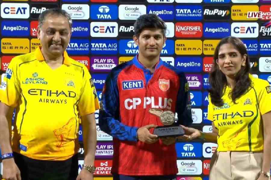 Priyansh Arya accepts the Player of the Match award