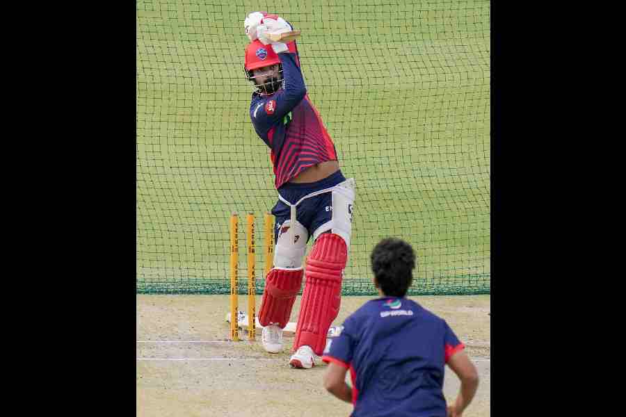 Delhi Capitals’ KL Rahul hits it straight at practice in New Delhi on Friday.