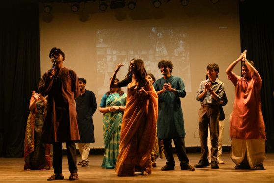 The second segment, “Punoray Basanta Bilap,” brought to life a theatrical adaptation inspired by the classic film Basanta Bilap. The performance captured the essence of youthful romance, humour, and reconciliation, with students delivering engaging portrayals reminiscent of legendary actors like Soumitra Chatterjee, Chinmoy Roy, and Rabi Ghosh. The character of Anuradha evoked memories of Aparna Sen’s iconic performances, adding a nostalgic charm to the production.