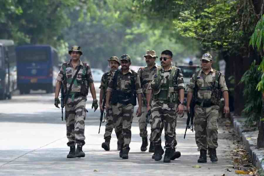 Central force personnel on Strand Road on Saturday. (Sanat Kr Sinha)