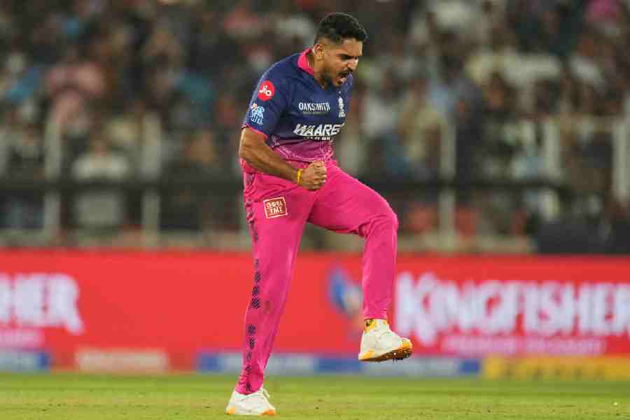Tushar Deshpande is jubilant after defending 10 runs inthe final over as Rajasthan Royals pull off a six-run winover Gujarat Titans in Ahmedabad on Saturday.