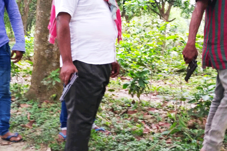 A miscreant carrying a gun