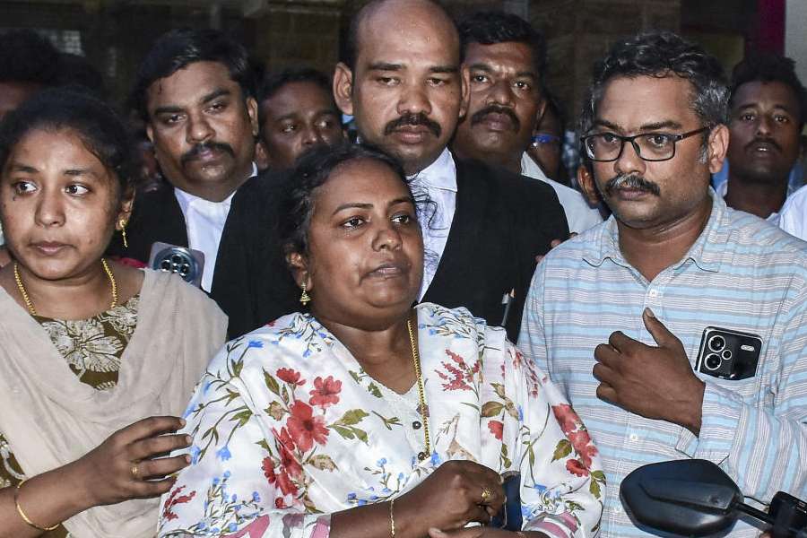 Family members of Jayaraj and his son Bennix, who died after alleged police assault in Sathankulam, address a press conference, in Madurai, Monday, April 6, 2026.