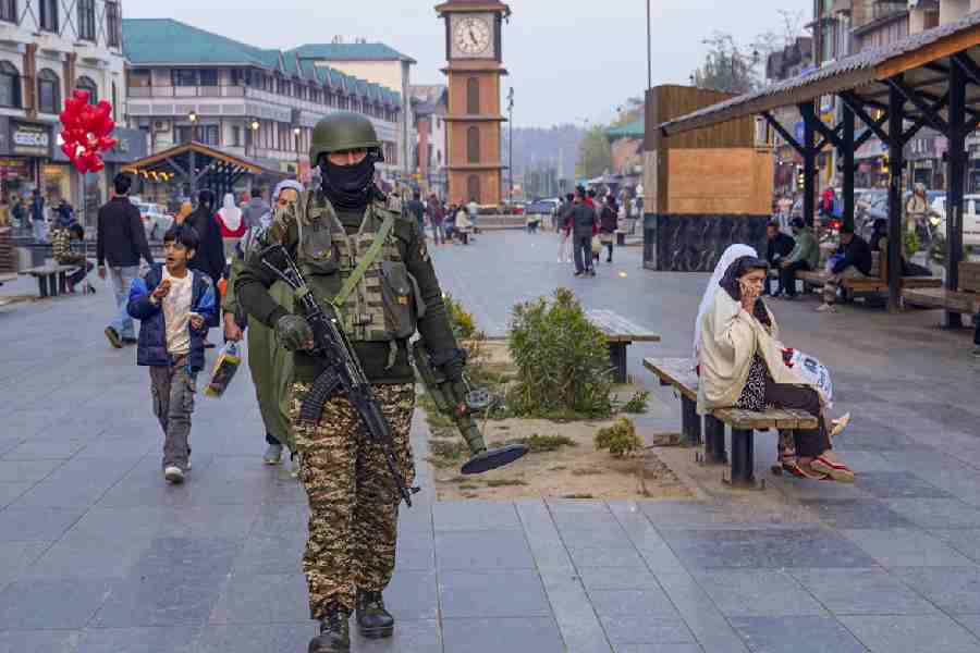 A soldier patrols a deserted Lal Chowk in Srinagar on November 12, 2025. 