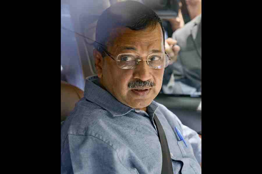 Arvind Kejriwal arrives at Delhi High Court on Monday. 