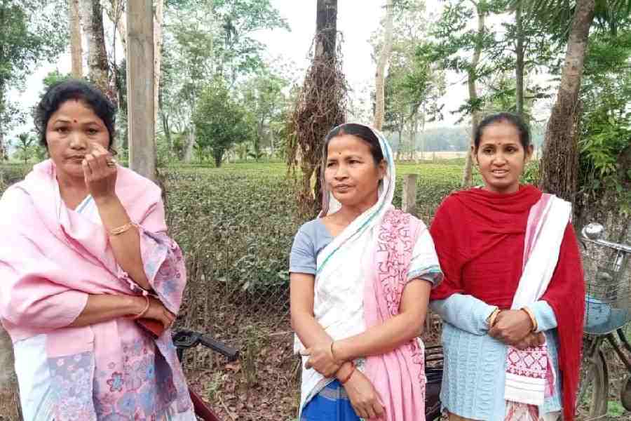 Poppy Gogoi (extreme left) says government schemes are supplementing the income of the poor