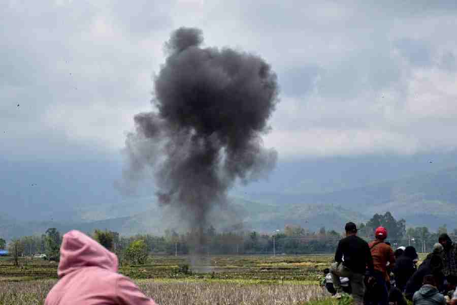Smoke rises after a munition was detonated by a bomb squad in Bishnupur district, Manipur, India, April 7, 2026.