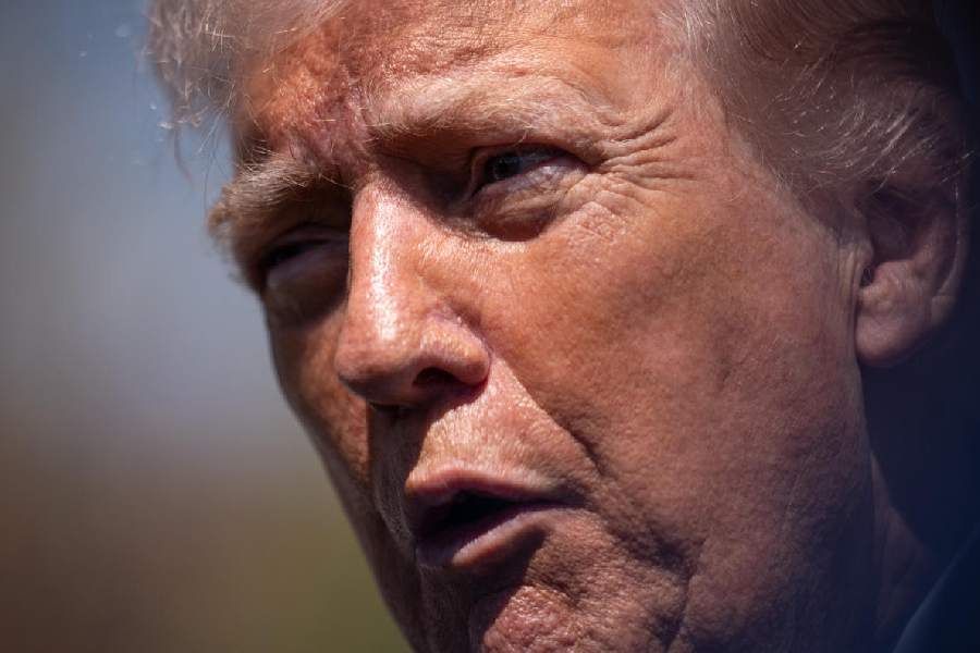 President Donald Trump speaks with reporters during the White House Easter Egg Roll on the South Lawn of the White House, Monday, April 6, 2026, in Washington.