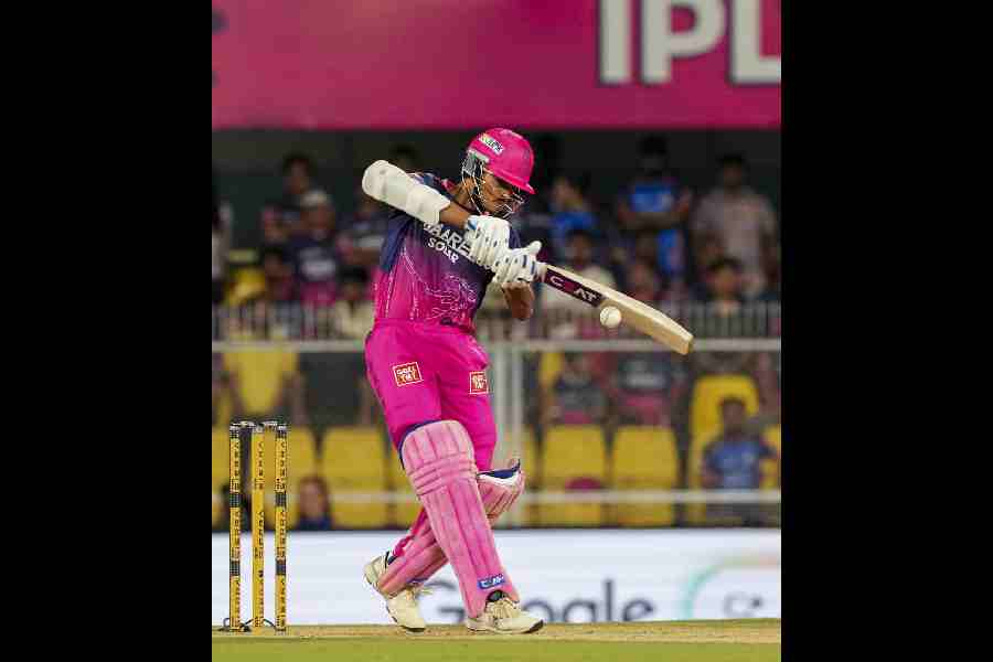 Rajasthan Royals’ Yashasvi Jaiswal smashes one en route to his unbeaten 77 off 32 balls, during which he hit 10 fours and four sixes, against Mumbai Indians in Guwahati on Tuesday.