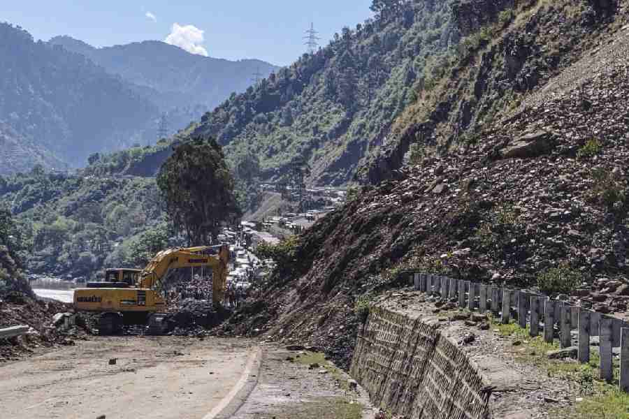 Clearance operation underway after traffic on the Jammu-Srinagar national highway was suspended following landslides and shooting stones triggered by rains, in Ramban, Jammu and Kashmir, Monday, April 6, 2026.