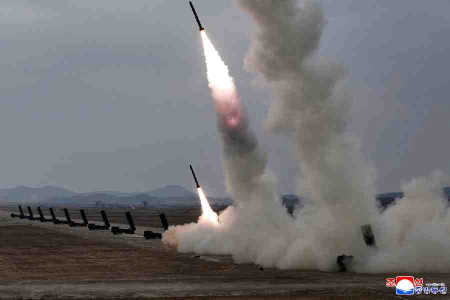 A test-launch of 600 mm-calibre multiple rocket launchers is overseen by North Korean leader Kim Jong Un (not pictured), North Korea, March 14, 2026, in this picture released by North Korea\\\'s official Korean Central News Agency.
