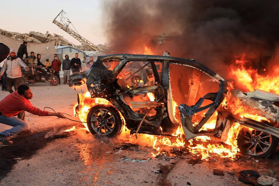 A vehicle burns following an Israeli strike that killed Al Jazeera journalist Mohammad Weshah, according to medics, in Gaza City April 8, 2026.