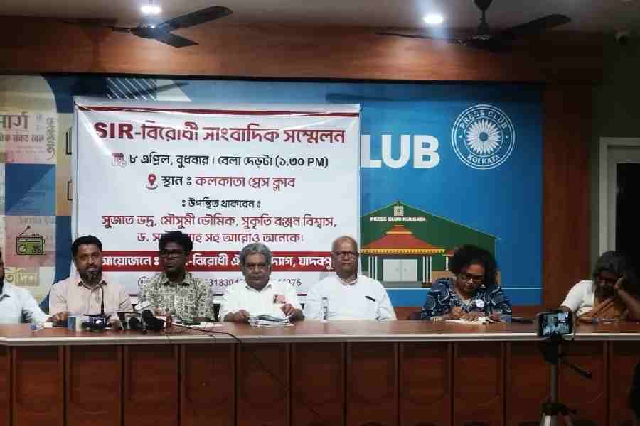 Speakers at the protest meeting against SIR exclusions