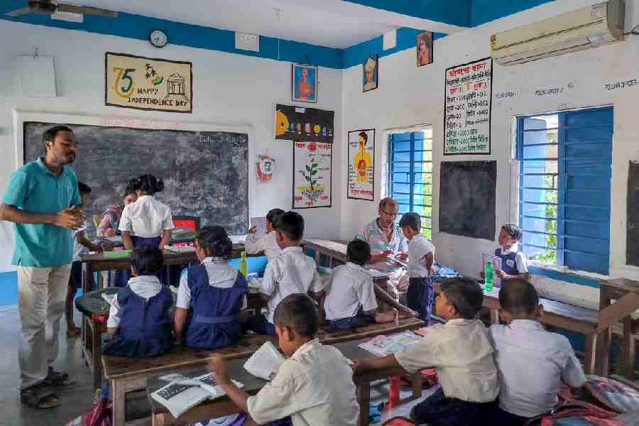 File photo of students in a government-aided school near Ranaghat, Nadia district. With most teachers on poll duty, students are facing loss of valuable class time 