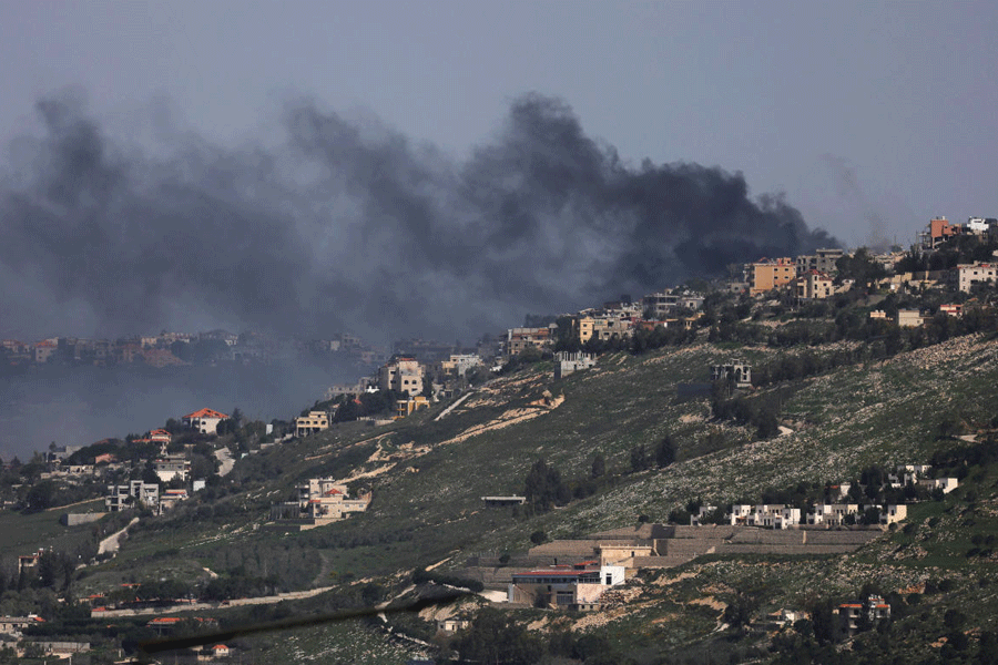 FILE PHOTO: Smoke rises from Khiyam, a Lebanese village near the border with Israel, amid escalation between Iran-backed Hezbollah and Israel, and amid the U.S.-Israeli conflict with Iran, as seen from northern Israel, March 18, 2026.