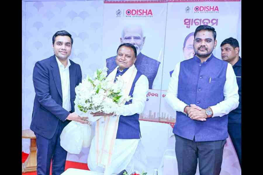 Karan Adani (left), with Mohan Charan Majhi at the event in Khurda on Wednesday.