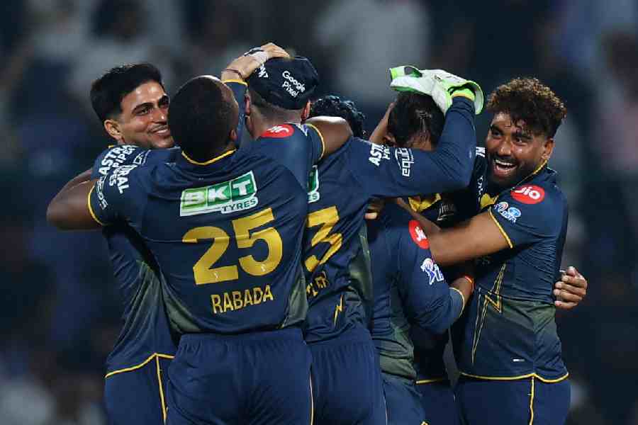 Gujarat Titans captain Shubman Gill (extreme left) celebrates with teammates