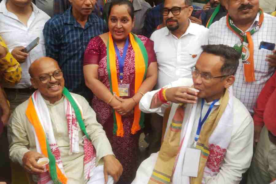 BJP MLA Hitendra Nath Goswami (left) and Congress MP Gaurav Gogoi share tea in Jorhat on Thursday