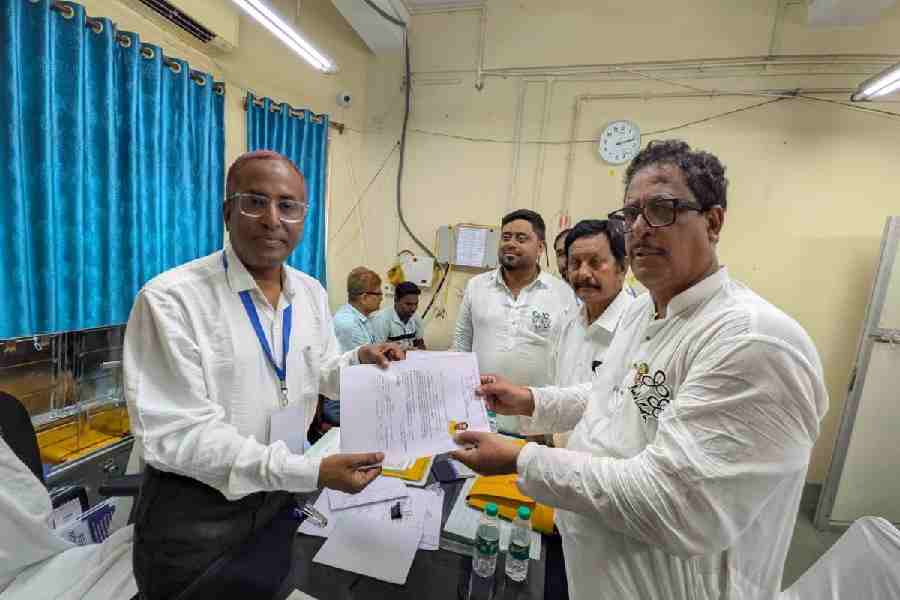 Trinamul Congress candidate Tapash Chatterjee submits his nomination on Tuesday