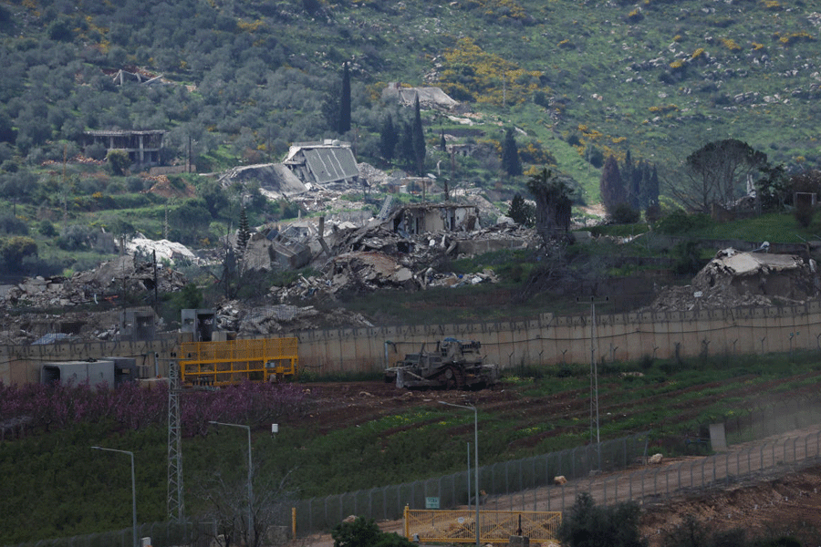 Damaged buildings at Kafr Kila following Israeli army activity across the border between Israel and Lebanon, as seen from Metula on the Israeli side of the border, April 9, 2026.