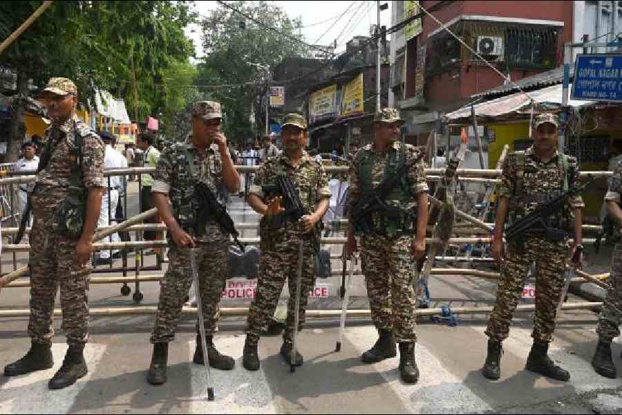 Central force personnel in front of the Survey Building in Alipore earlier this week. Picture by Sanat Kr Sinha