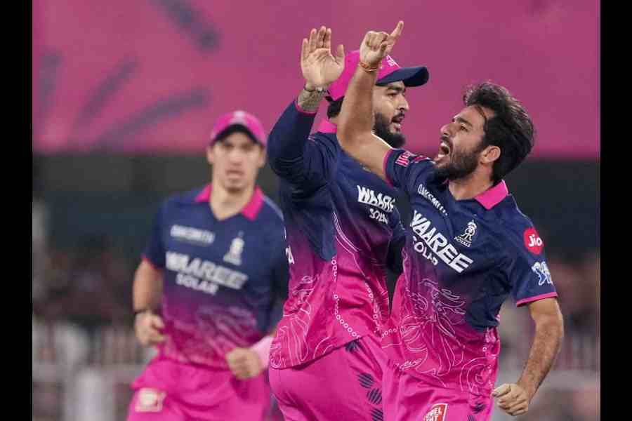 Ravi Bishnoi celebrates with captain Riyan Parag on dismissing Virat Kohli during the match between Rajasthan Royals and Royal Challengers Bangalore on Friday, April 10, 2026.