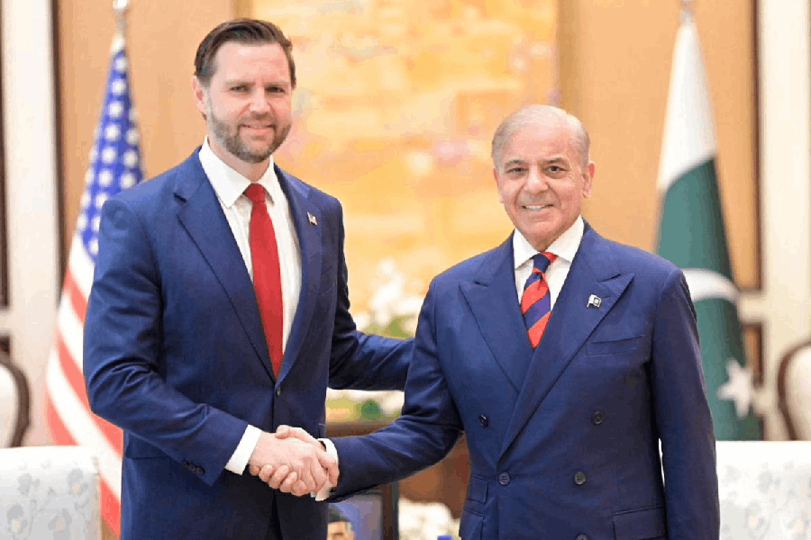 Pakistan's Prime Minister Shehbaz Sharif shakes hands with U.S. Vice President JD Vance during their meeting, on the day delegations from the United States and Iran are to hold peace talks, in Islamabad, Pakistan, April 11, 2026.