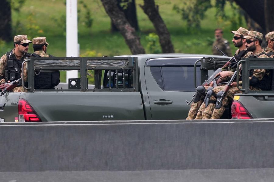Pakistan Army troop escort a convey believed to be carrying U.S. Vice President JD Vance upon his arrival for talks with Iranian officials in Islamabad, Pakistan, Saturday, April 11, 2026.