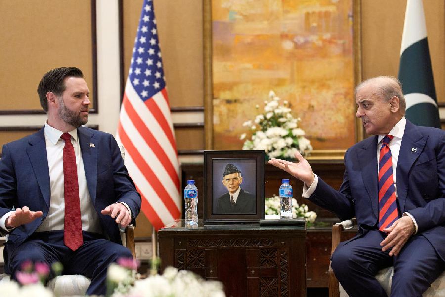 US Vice President JD Vance, left, meets with Pakistan's Prime Minister Shehbaz Sharif, Saturday, April 11, 2026, in Islamabad, Pakistan for talks about Iran.