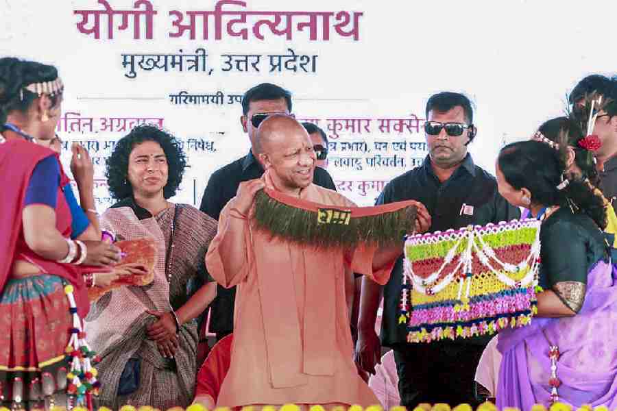 Yogi Adityanath at the land-allotment event in Uttar Pradesh on Saturday. 