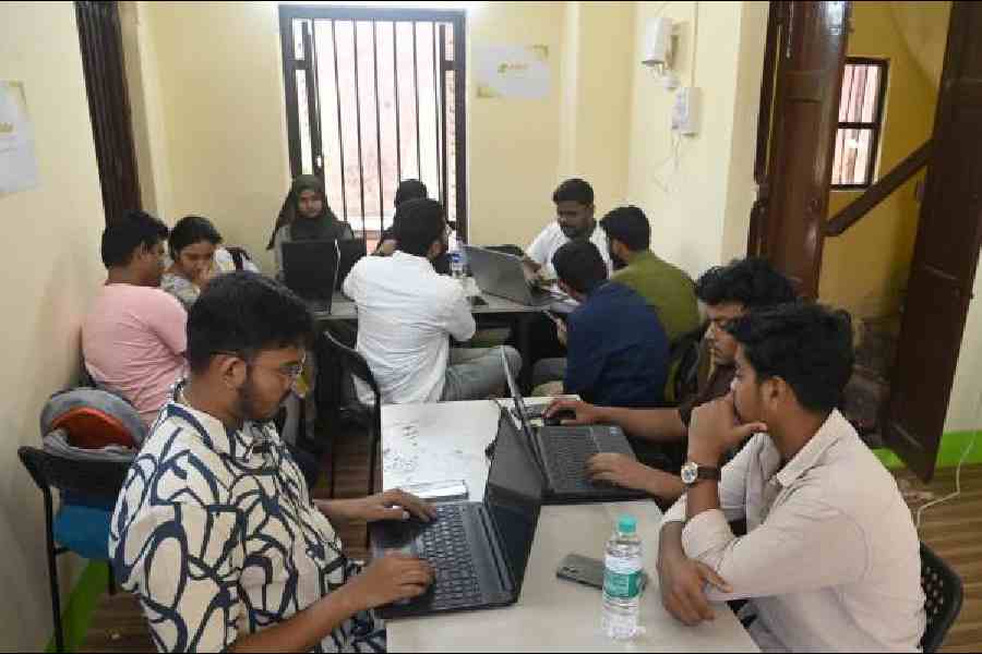 The Sabar Institute team at work at their Kidderpore office on Saturday. Pictures by Sanat Kr Sinha