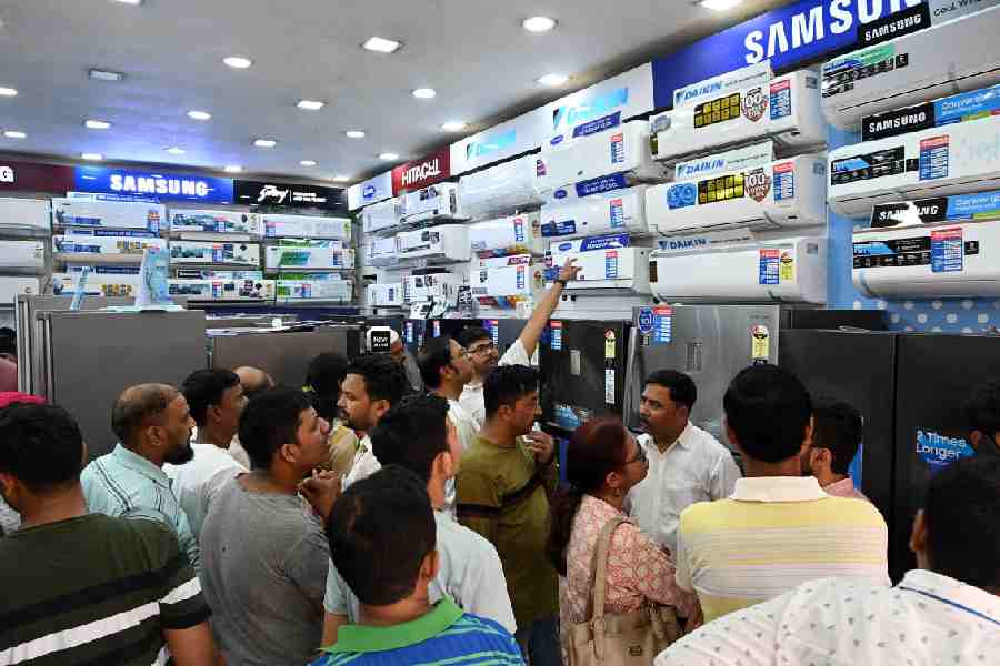 A crowded electronics shop selling ACs in Calcutta