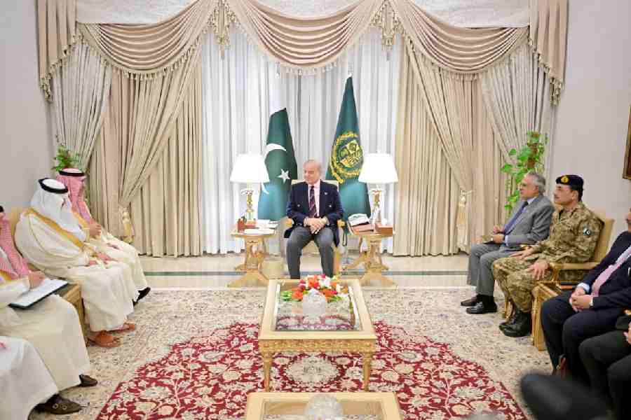 Pakistan's Prime Minister Shehbaz Sharif along with Pakistan's Chief of Army Staff (COAS) Asim Munir during the meeting with Saudi Arabia Finance Minister Mohammed Al-Jadaan as Pakistan prepares to host the U.S. and Iran for peace talks, in Islamabad, Pakistan April 10, 2026.