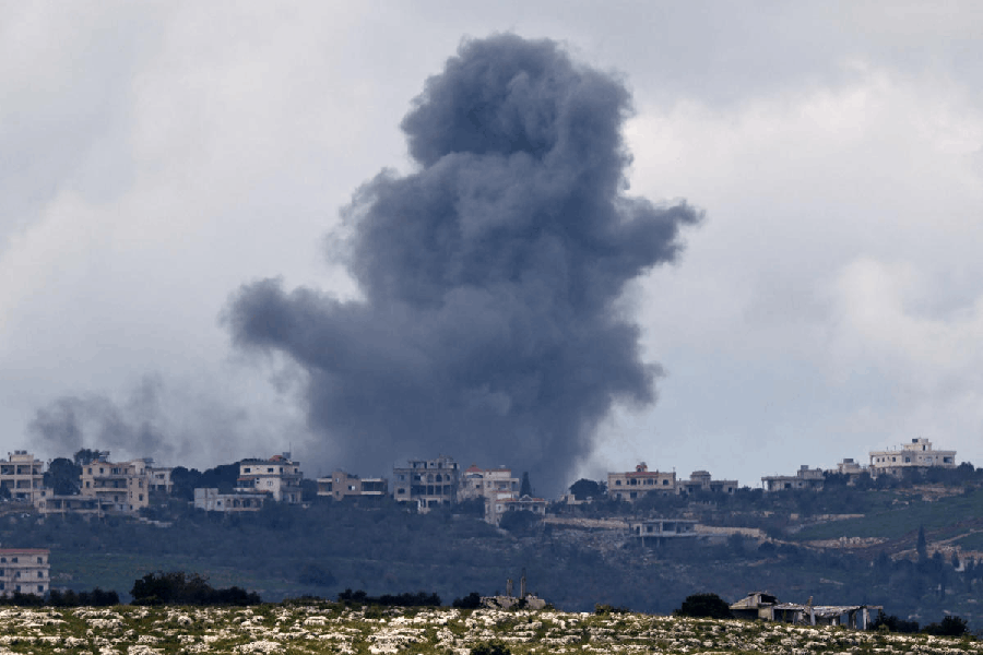 Smoke rises following an airstrike in Lebanon, as seen from Israeli side of the border, April 12, 2026.