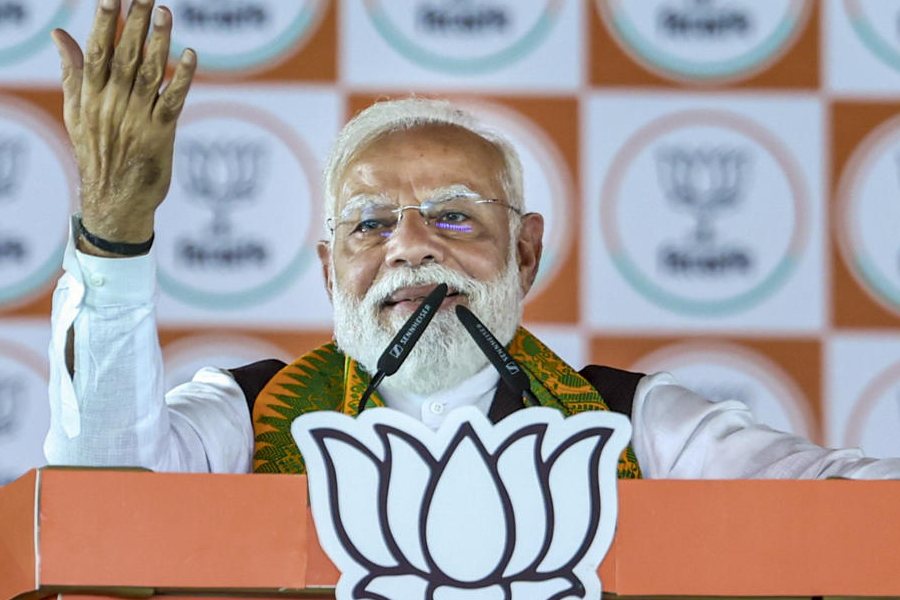 In this image posted on April 12, 2026, Prime Minister Narendra Modi addresses a public meeting ahead of the West Bengal Assembly elections, in Siliguri.