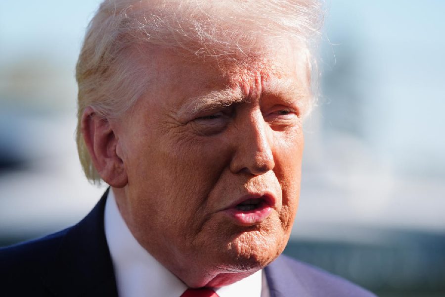 President Donald Trump speaks with reporters before departing on Marine One from the South Lawn of the White House, Saturday, April 11, 2026, in Washington.