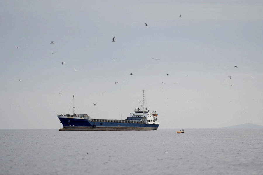 A vessel at the Strait of Hormuz, off the coast of Oman’s Musandam province, April 12, 2026.