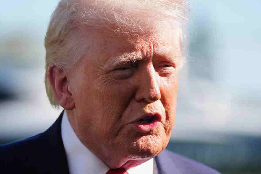 President Donald Trump speaks with reporters before departing on Marine One from the South Lawn of the White House, Saturday, April 11, 2026, in Washington.