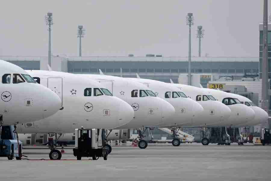 Lufthansa aircraft are parked at an airport as Lufthansa pilots are on a two-day strike in Munich, Germany, Monday, April 13, 2026.